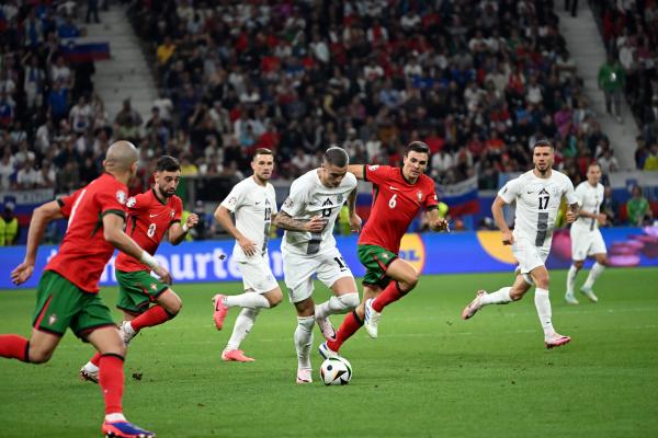 FOTO: Slovenski nogometaši po enajstmetrovkah izgubili proti Portugalcem