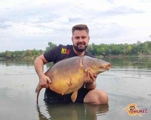 FOTO: Zver z osebnim rekordom: v Krogu ujel kar 25,40-kilogramskega krapa