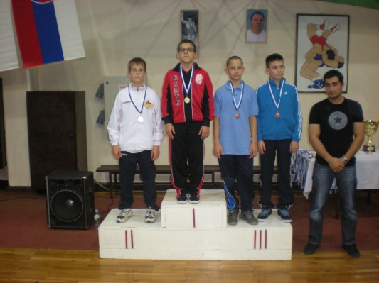 Mlada rokoborca Timi Gumilar in Aljaž Zadravec srebrna